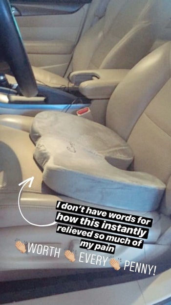 Reviewer photo of the chair cushion on a car seat with the caption 
