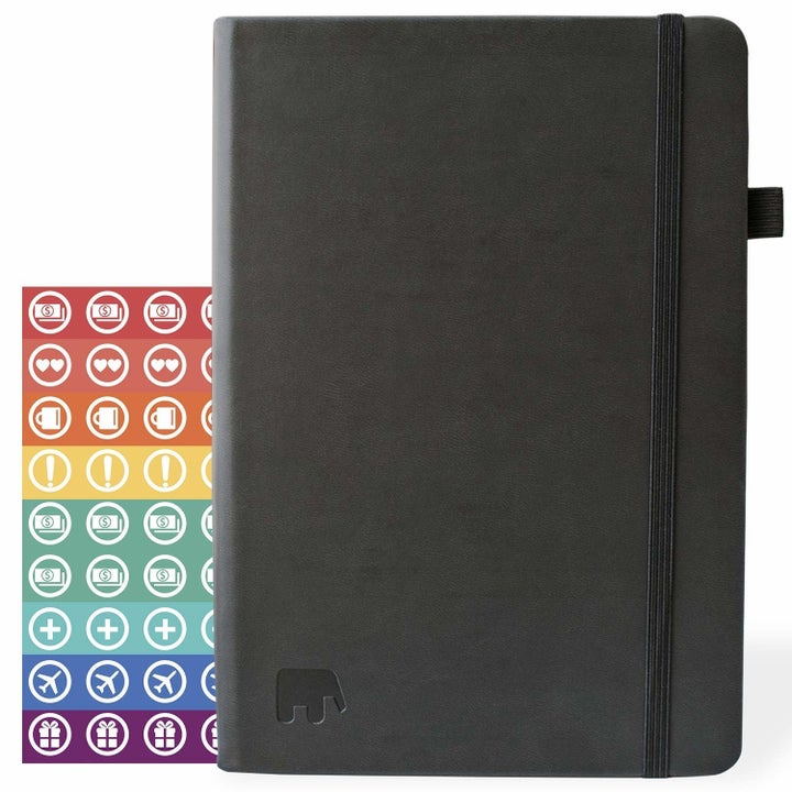 black planner with organizational stickers