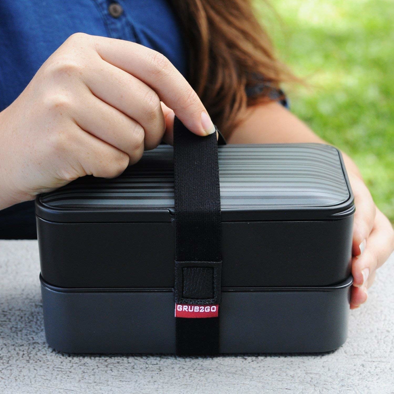 Promising review: "This bento box is perfect for what I need. Instead of bringing several containers to work each day, I just bring this. It's great that I can have a hot meal for future heating in one section and cold food items in the other. Each section is sealed airtight — no leaking. They heat up in the microwave easily. The little air vent helps with reheating. They clean up super easy with soapy water. Well made. Fairly stylish. Great product." —Chuck GhouliePrice: $21.95