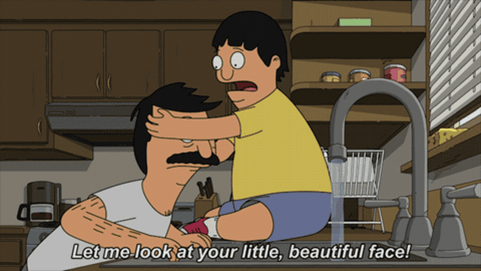 Gif of Gene Belcher from Bob&#x27;s Burgers holding Bob and saying &quot;let me look at your little, beautiful face!&quot; 