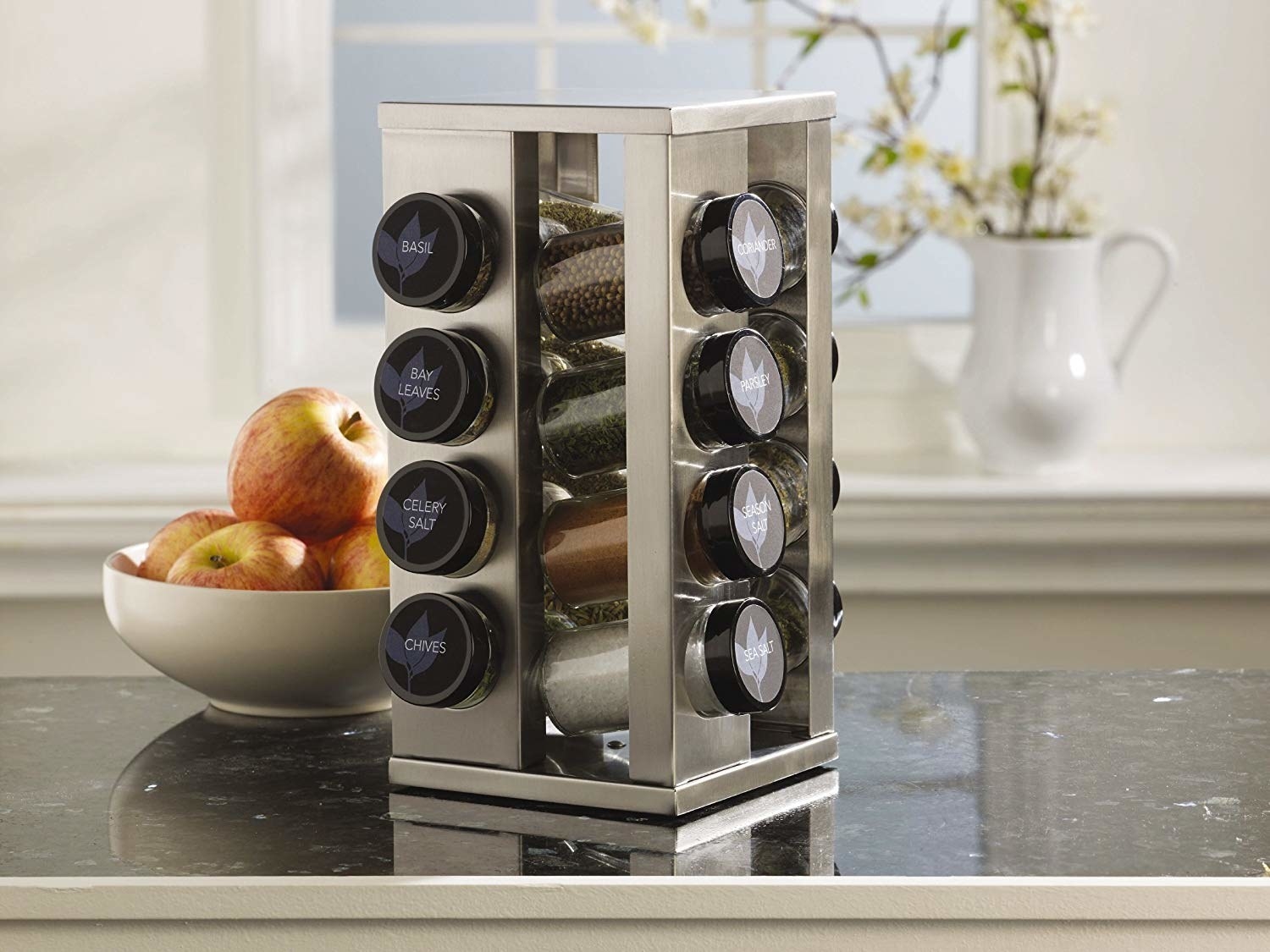 rotating rectangular stainless steel spice rack with four spices on each side