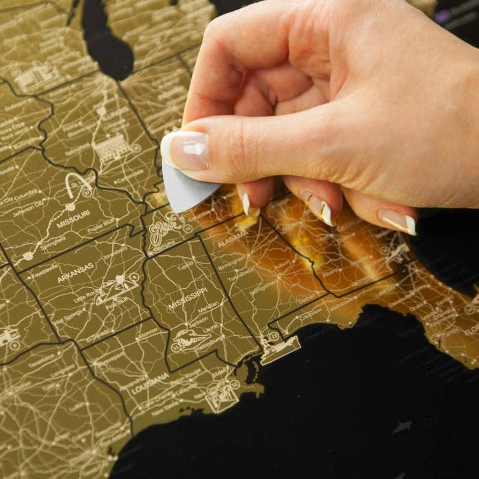 model scratching off gold USA map