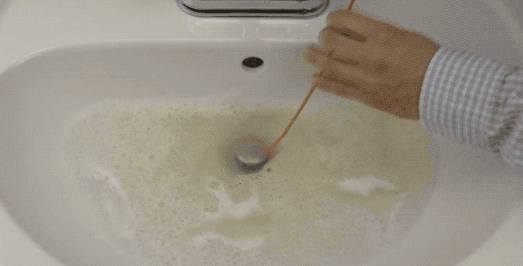 You just insert it down your drain, twist it a few times via the handle, let the grabby micro-hooks on the tip (similar to Velcro) do their work on the stuck, clogging hair and debris. Then pull it up, and your sink will drain like it's new! Get one (with five included refills) on Amazon for $18.95.