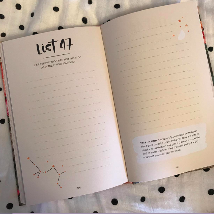 A customer review photo showing the inside of the journal and one of the prompts