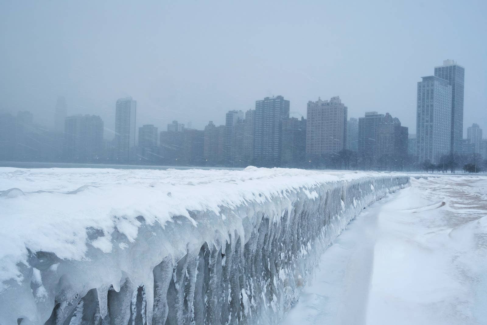 Icicles form on the walkway at North Avenue Beach of Lake Michigan in Chicago on Tuesday.