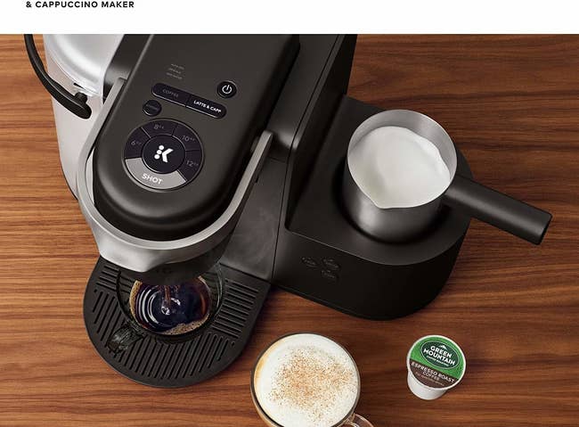 keurig machine brewing coffee and steaming milk