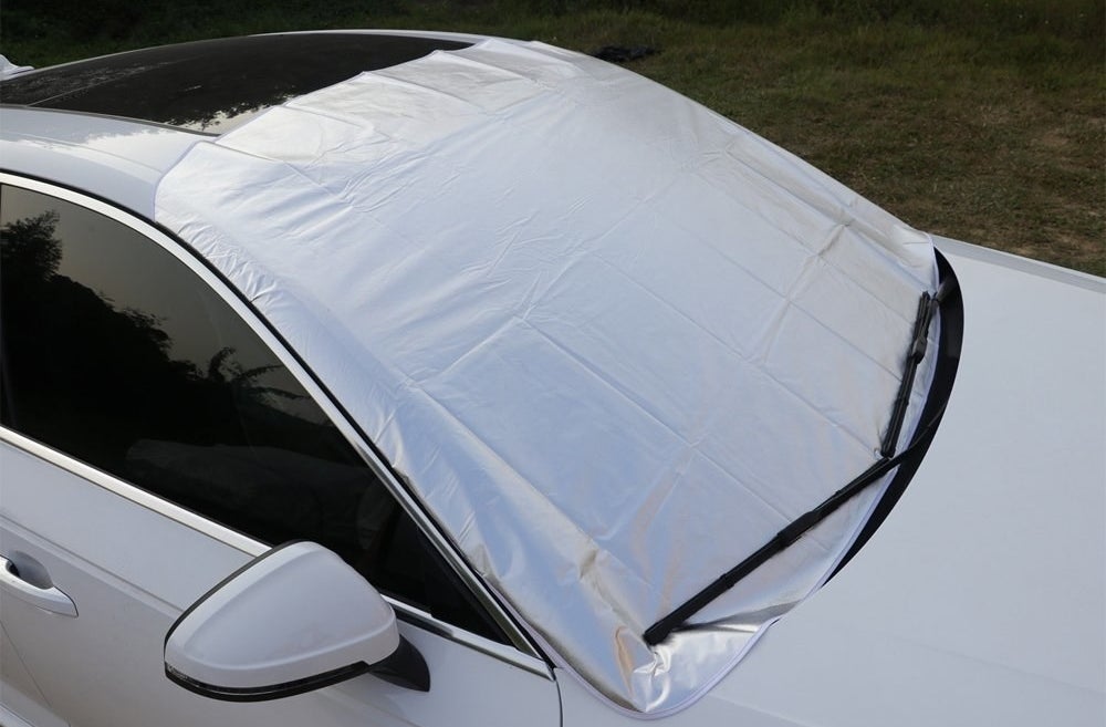 This is water-, dust-, sun-, and frost-proof, and fire-retardant! Just keep this covered on your vehicle while it's parked in the driveway or a parking lot, peel it off before getting in the car, and no snow/ice scraping needed!Promising review: "This is the best windshield cover I ever bought, it stays put, non-sticky to the windshield, cover from snow, and easy to remove, love to use it before a snow storm. I am thinking of buying another one for my back windshield." —CatzzzzGet it from Amazon for $12.99+ (available in three colors).