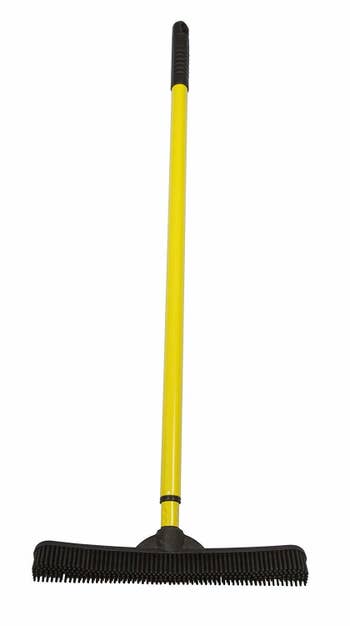 a yellow and black broomstick