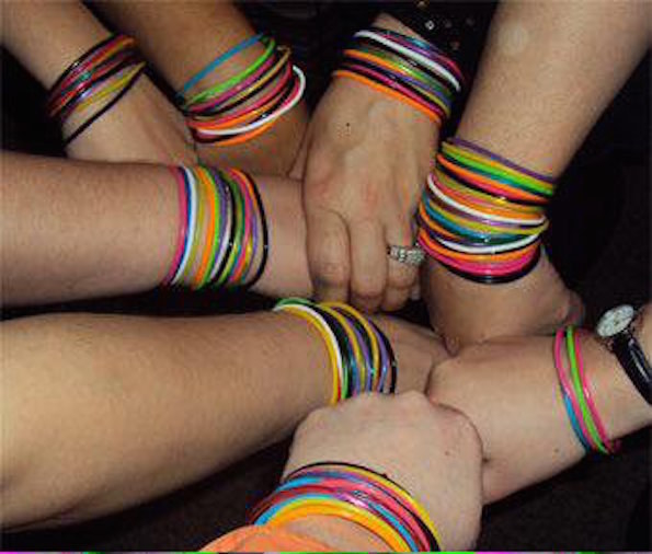 Eight arms in a group each with various colored jelly wristbands