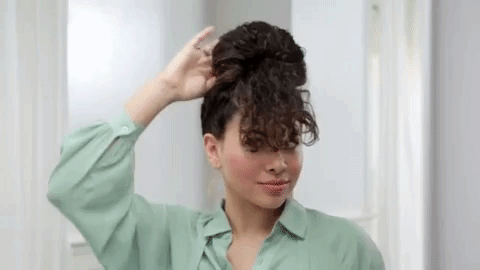 Check out more from Birchbox for the full tutorial!What you'll need: hair spray ($35 on Birchbox), curl-styling cream ($26 on Birchbox or $5.89 on Amazon), and extra-strong hair ties ($10.99 on Amazon; available in eight colors).Too much work? Try these faux bang extensions ($5.99 on Amazon; available in 18 shades) that already have tons of reviews about how these look super realistic!