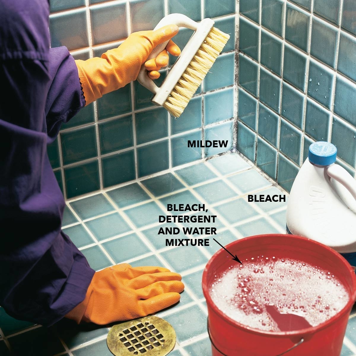 model working in shower with mildew, bleach, and a a bleach, detergent, and water mixture
