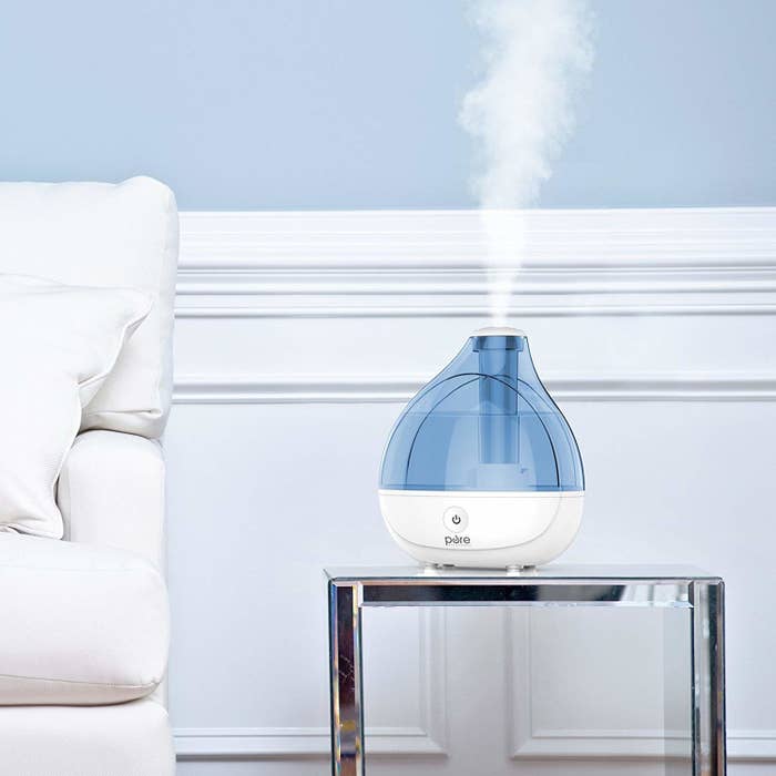 the humidifier on a side table in a living room 