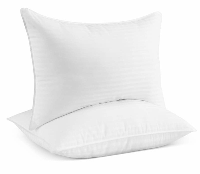 Two white pillows stacked on top of each other