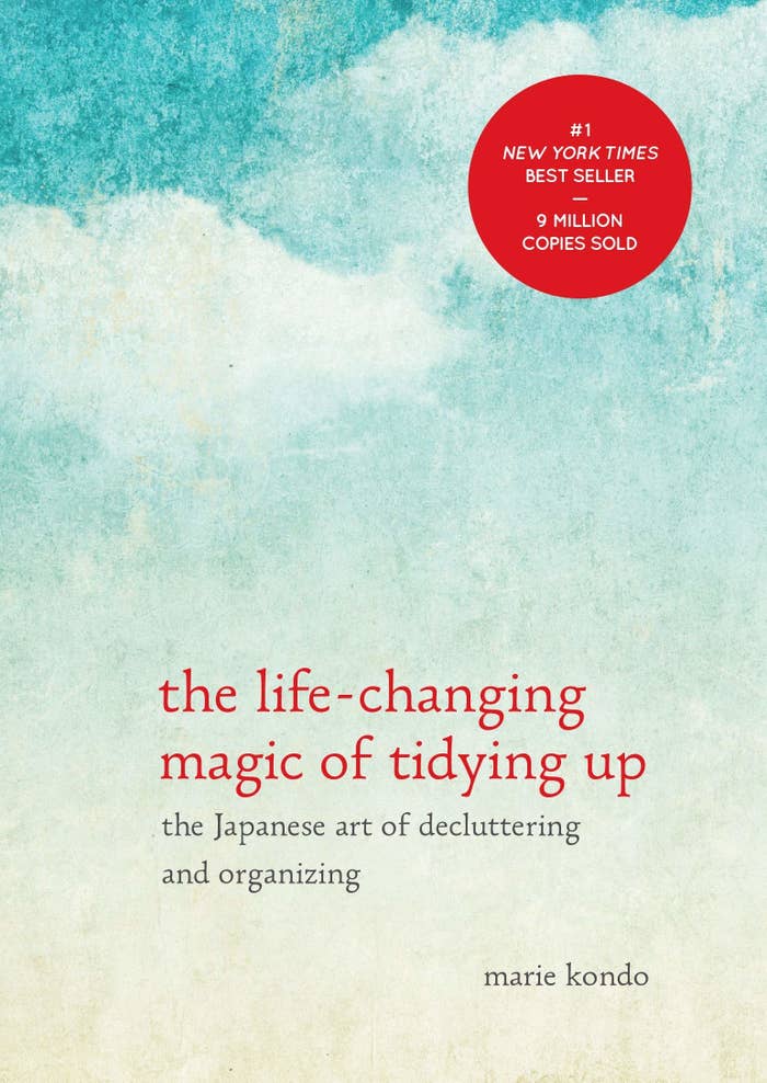 The cover with the title, the subtitle &quot;the Japanese art of decluttering and organizing&quot;, and the author, Marie Kondo