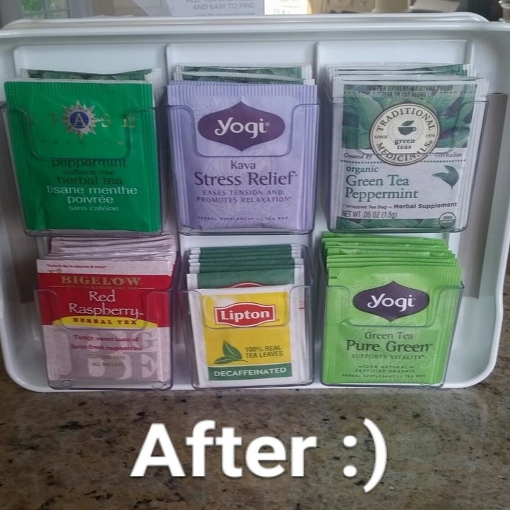 The same reviewer showing individual tea bags neatly placed inside clear bins in the organizer