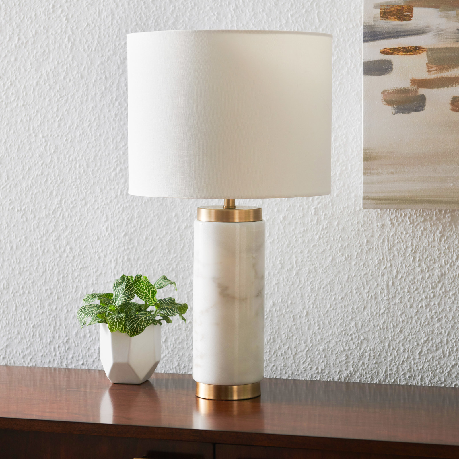 There is a 100-watt Type A bulb included. It has a three-way switch and a five-foot cord.Price: $129