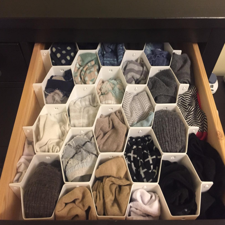 the drawer organized with everything in its own cubby 