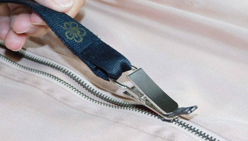 Promising review: "So in the old days, I rigged up a zipper puller with a paper clip and a string. I've found myself getting into all kinds of contortions trying to pull up zippers in public, so my curiosity was definitely piqued when I saw this little item. Lo and behold, it does exactly what it's supposed to do. This really is a life changing thing for me. Now I don't have to choose my dresses according to whether or not my spouse is home to help me zip!" —Vicky EmbreyGet it from Amazon for $14.99+ (available in three colors).