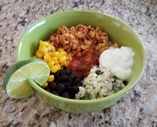 99% fat free ground turkey and riced cauliflower are the key tweaks in this recipe. Bye forever, Chipotle. Get the recipe here.