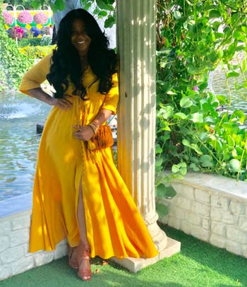 A customer review photo of the yellow dress