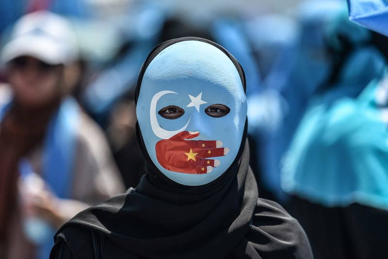 A demonstrator protesting against China&#x27;s treatment of Uighur Muslims outside the Chinese consulate in Istanbul in July 2018.