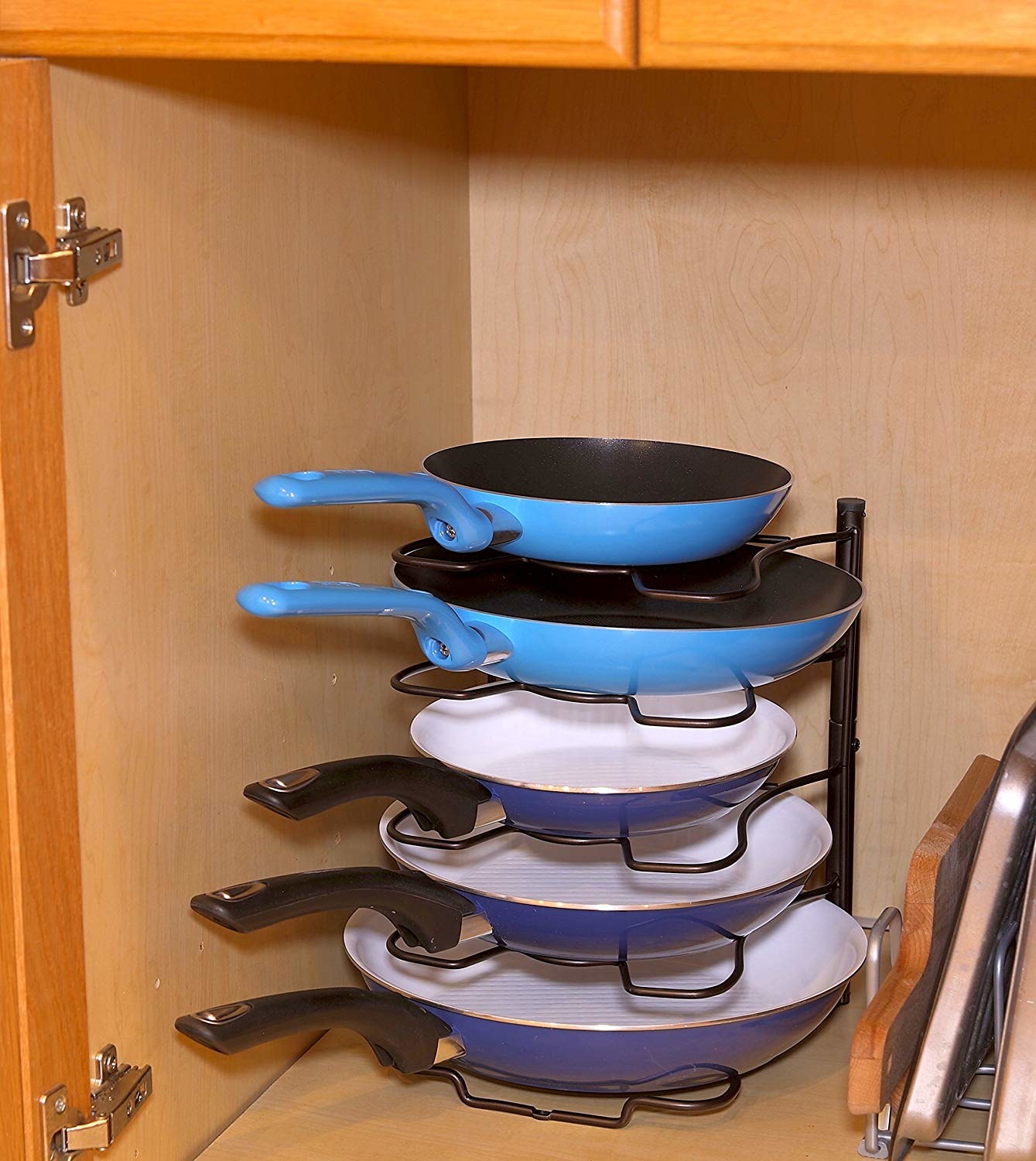 A five-tiered rack to hold a variety of frying pans