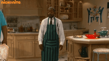 Gif of Geoffrey from &quot;Fresh Prince of Bel-Air&quot; dancing in kitchen