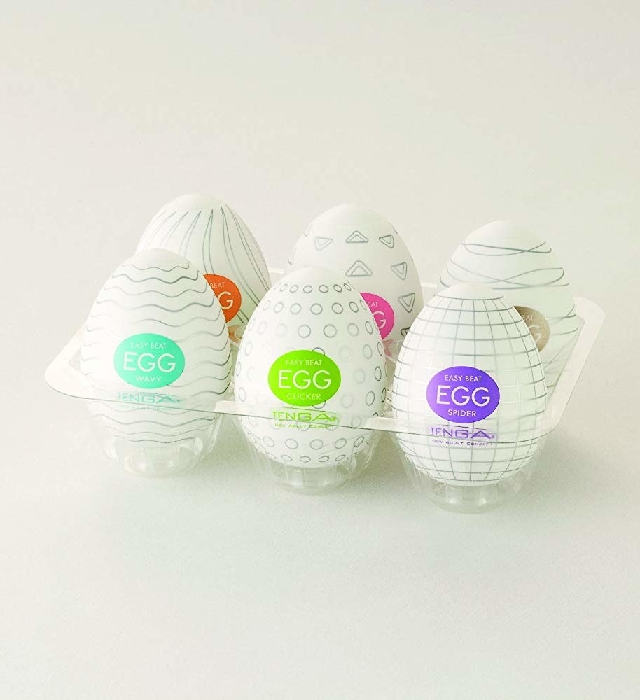 a six pack of eggs with different patterns 