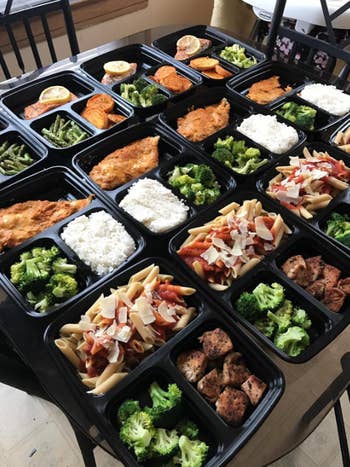 Reviewer meal prep containers with food in them