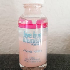 The bottle of lotion, pink on the bottom and clear on top (what you dip through to get to the pink)