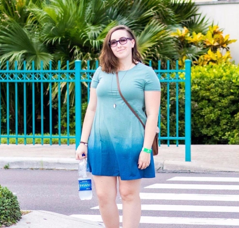 Reviewer wearing blue ombre dress