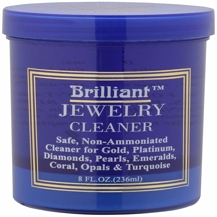 a jar of jewelry cleaning solution