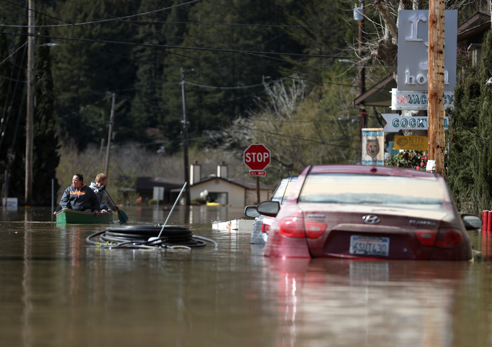 Photos Show California Residents Paddling Around As Catastrophic Floods