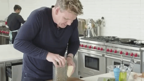 This will help firm it up so you're not just smashing it against the grater.See how he does it.
