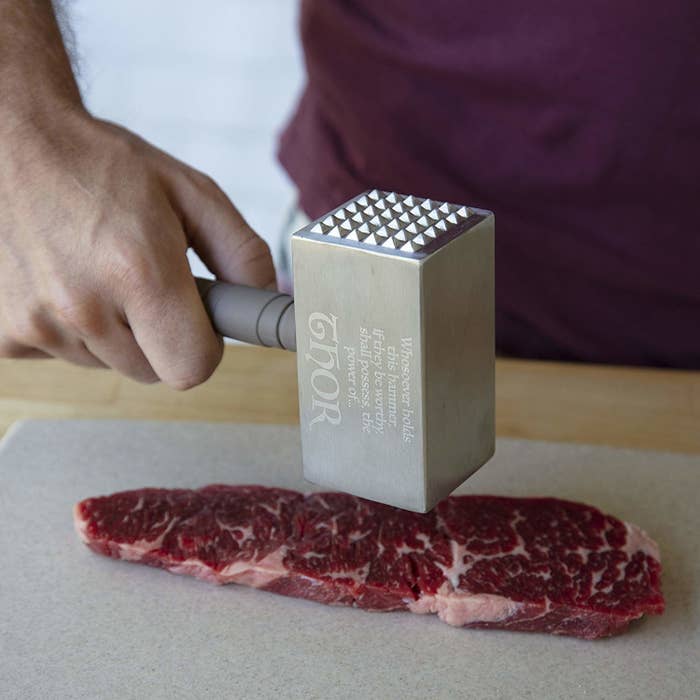 gray meat mallet shaped like Thor&#x27;s hammer