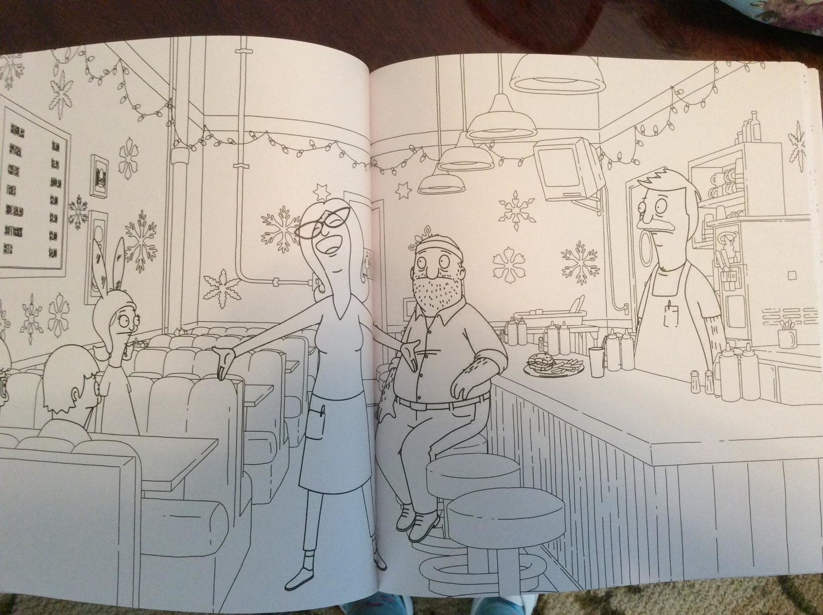 page of the coloring book showing the family&#x27;s restaurant