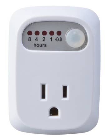 automatic shutoff safety outlet on a white background