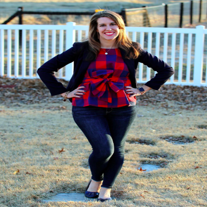 reviewer wears plaid top with blazer