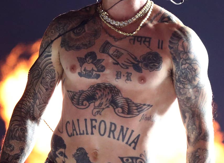 Twitter Thinks That Adam Levine's Tattoos And Nipple Spell The Word 