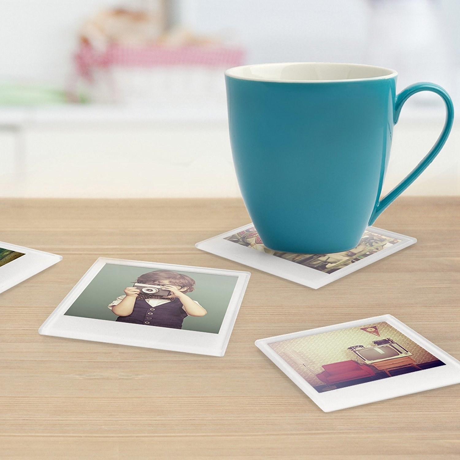 Promising review: "I bought this as a wedding gift for a bride who loves to take Polaroids. They plan to add wedding photos and use these on their coffee table." —TaylorGet a set of four from Amazon for $12.