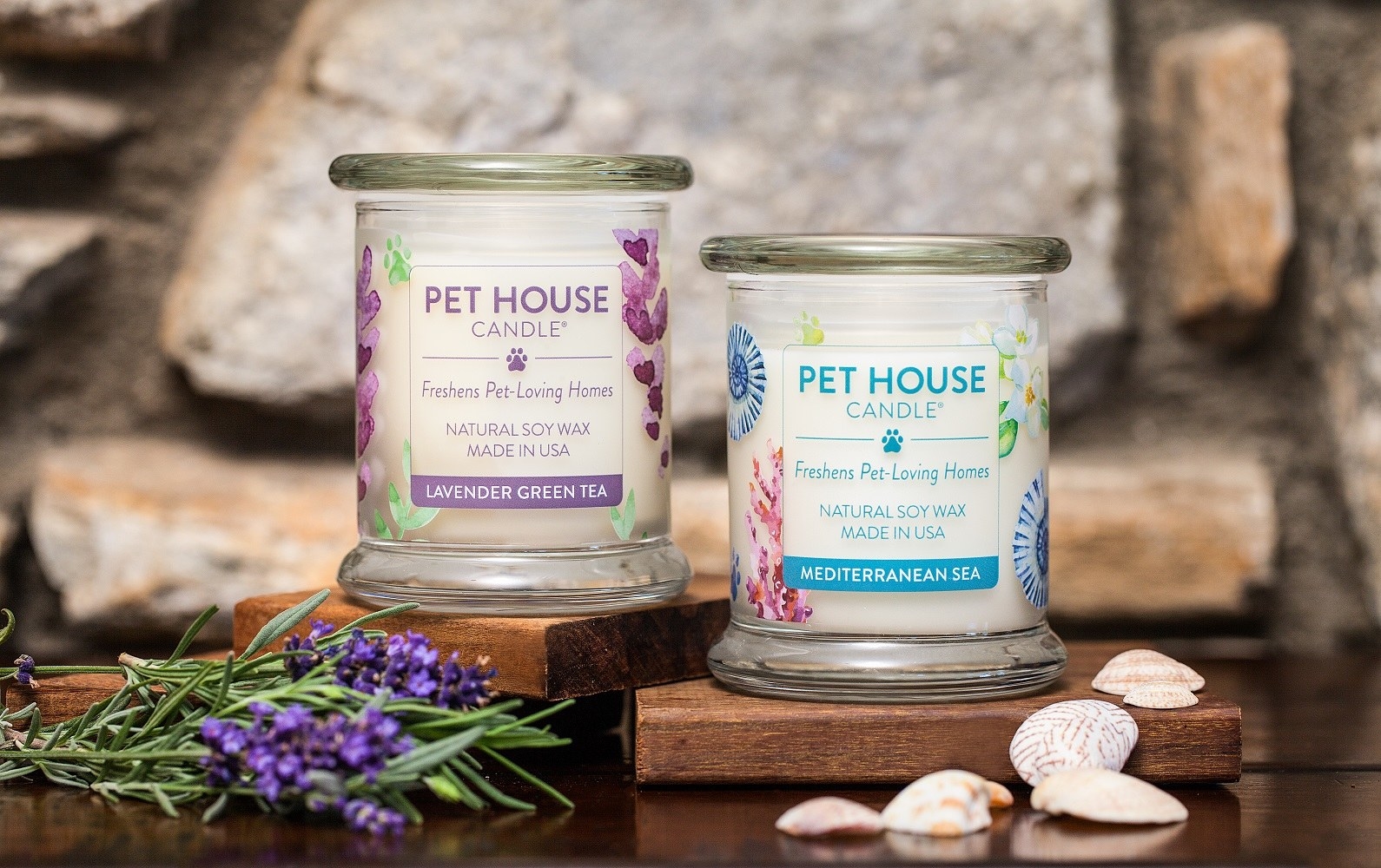 a lavender green tea candle and a mediterranean sea candle in glass jars