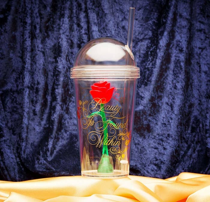 clear tumbler with rose inside 