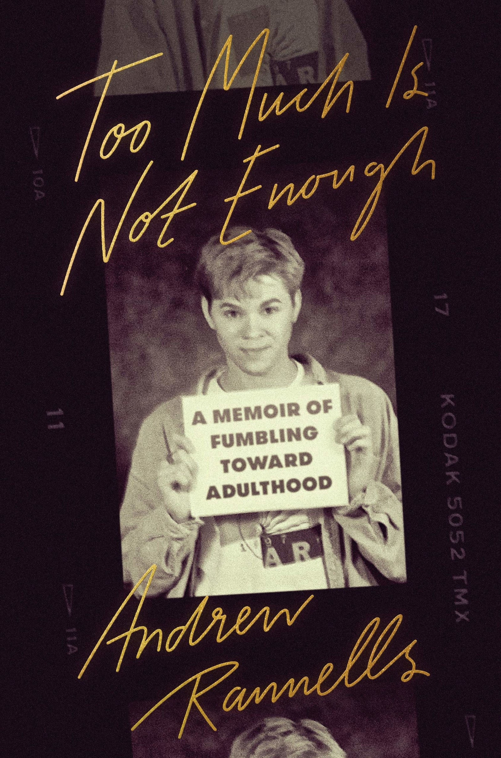 The cover of the book with pictures of Andrew Rannells and the title in gold