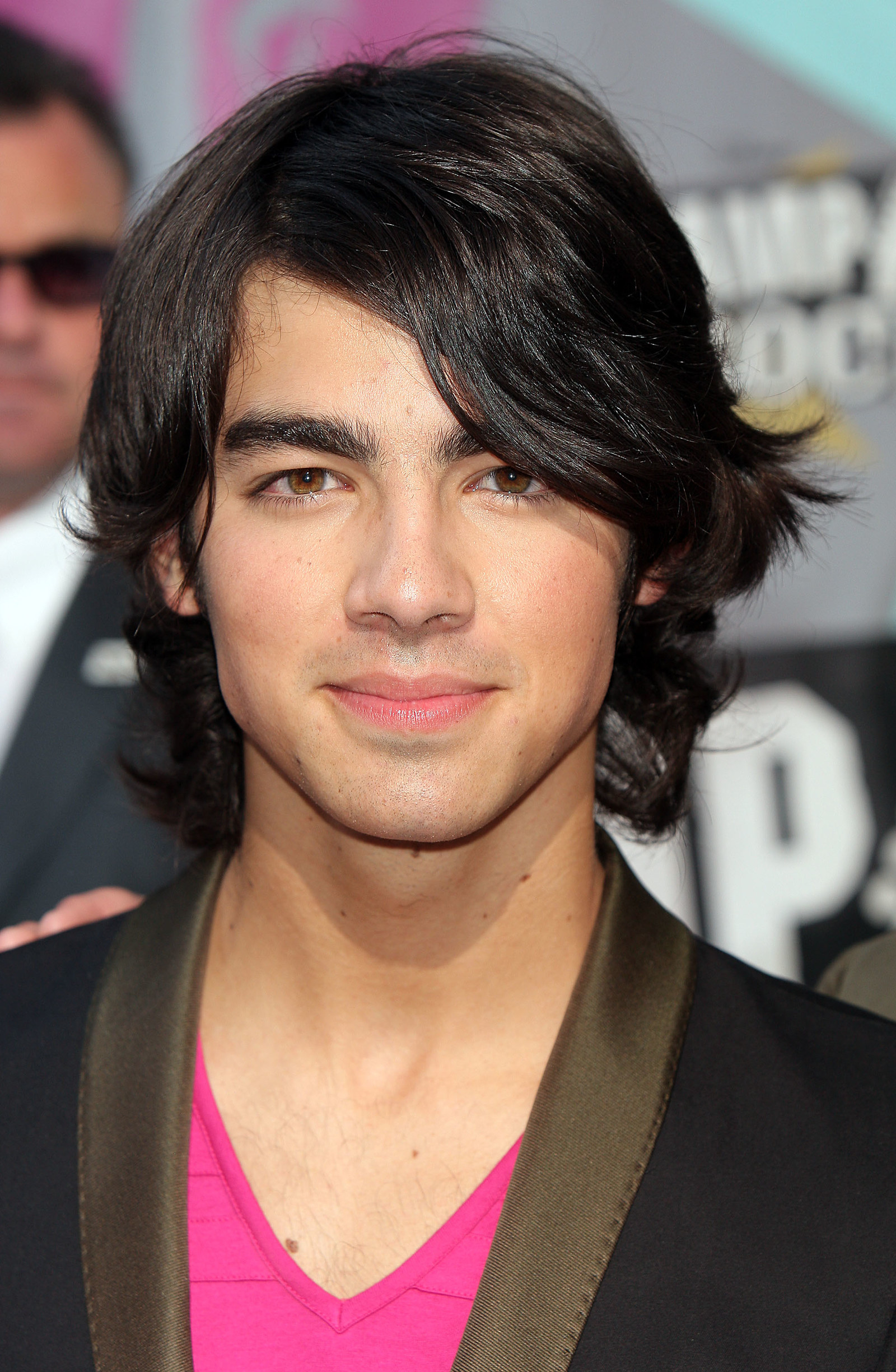 Joe Jonas Debuted Hot Pink Hair in Honor of Breast Cancer Awareness Month   See the Photos  Allure