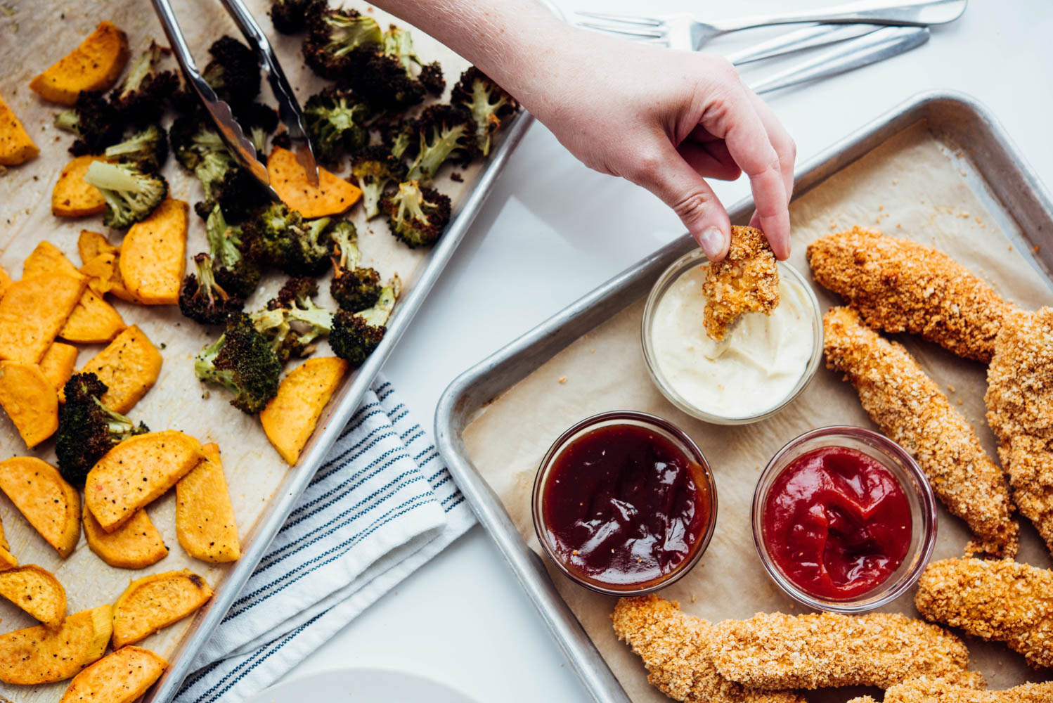 One pan of roasted veggies, and another filled with crispy chicken tenders. What's not to love?Estimated recipe cost: $10Get the recipe.