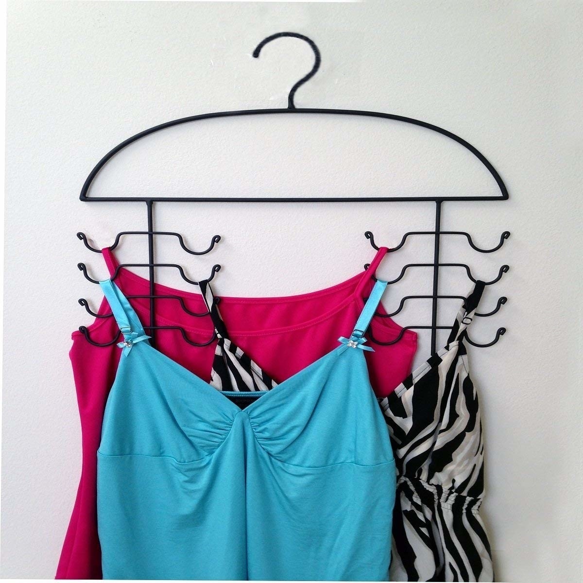 cami hanger with multiple shirts hung on one hanger