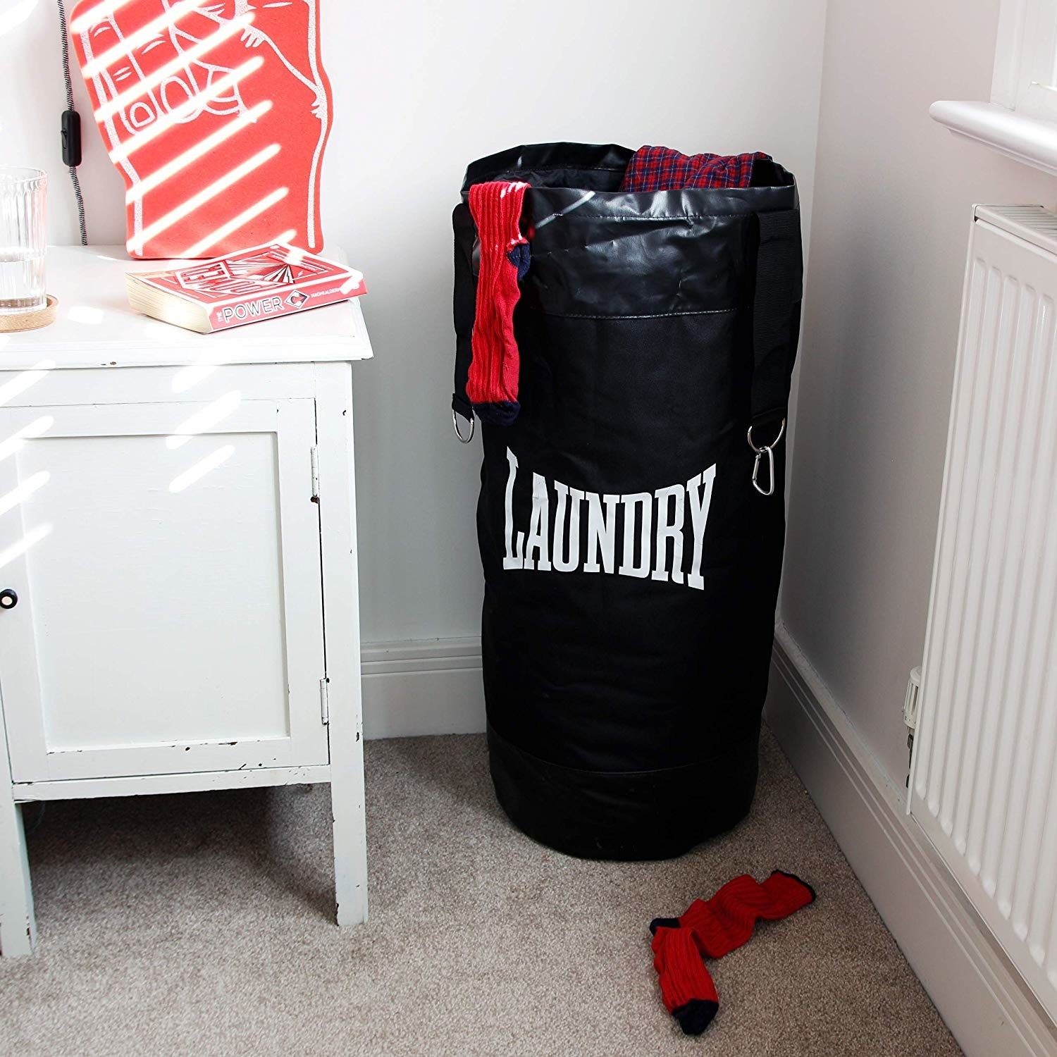 Punching bag shaped laundry bag 