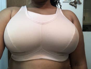 person wearing a white sports bra