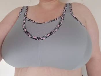 person wearing a grey sports bra