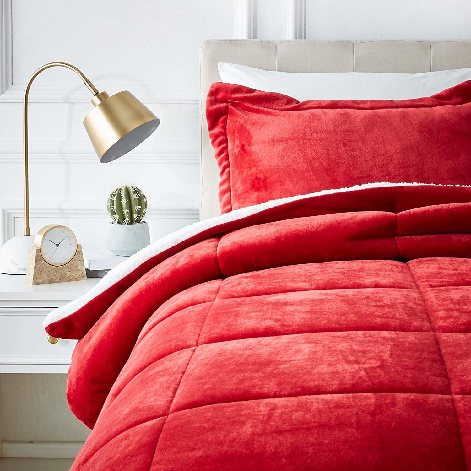 Bright red bedding in plush, quilted pattern 
